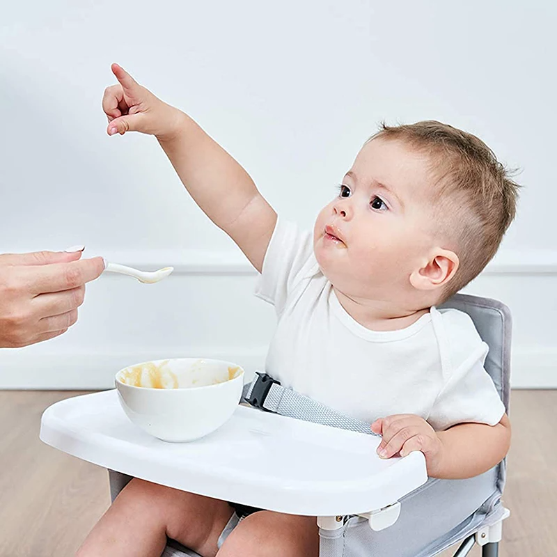 Kid Using The Portable Baby Chair
