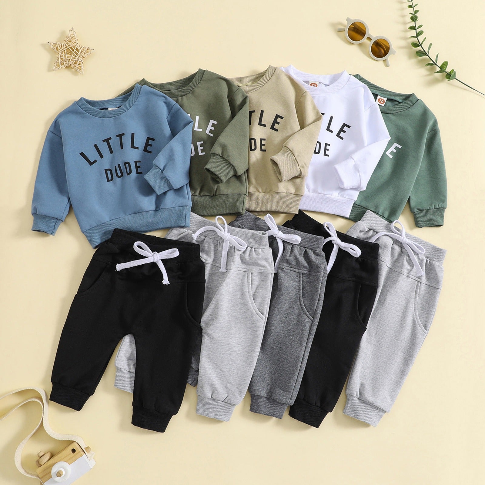 Children's Clothes In Beige Background and with pants